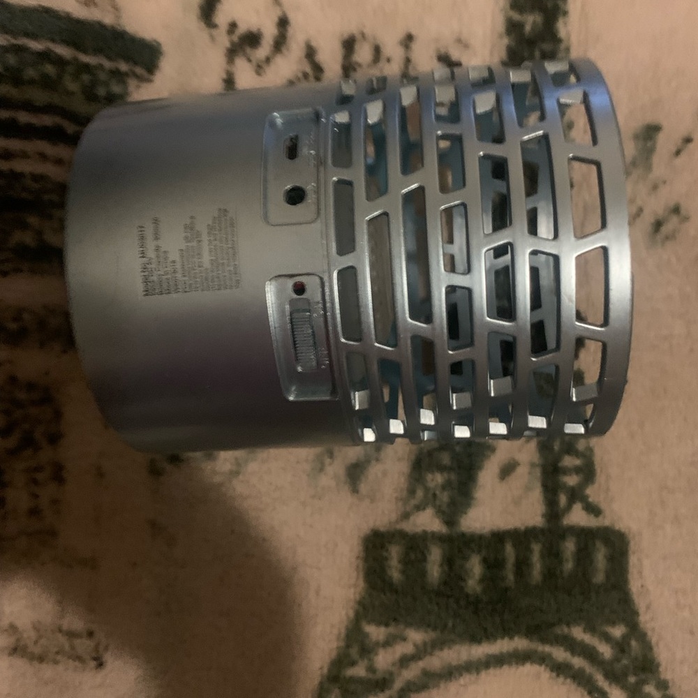 I’m selling a gray Bluetooth speaker.